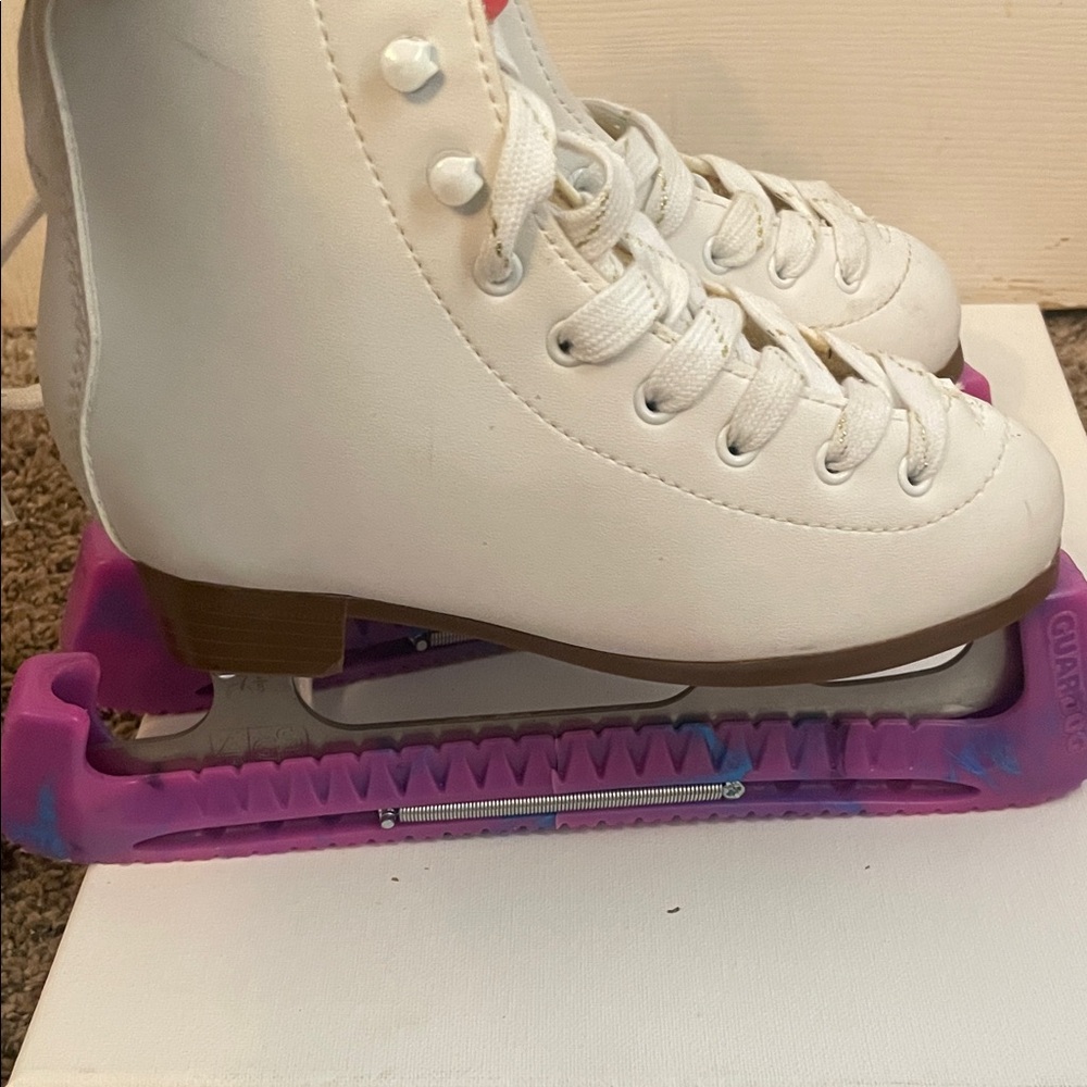 White DBX Shapened Ice Skates with Purple Blade Guards
